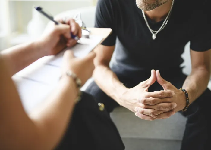 man getting therapy for substance abuse.